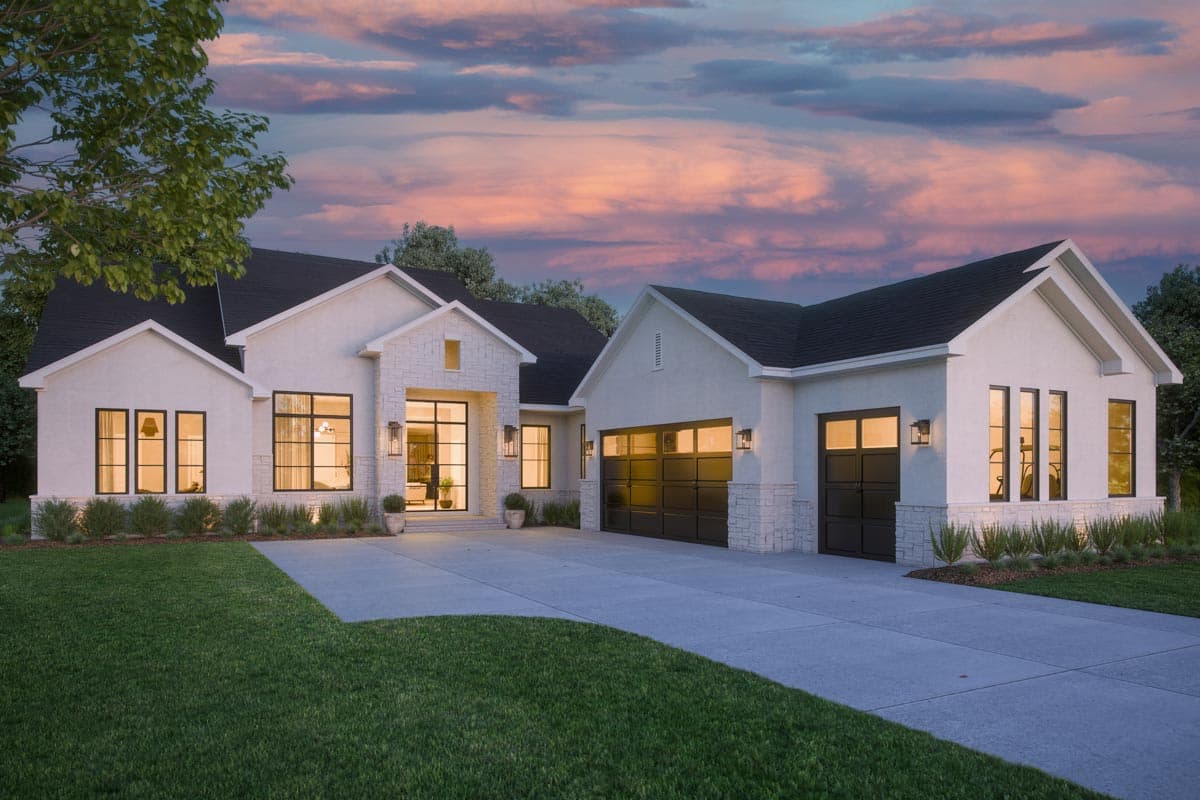House plan exterior with white stucco, stone accents, pitched roofs, black-framed windows, and a three-car garage.