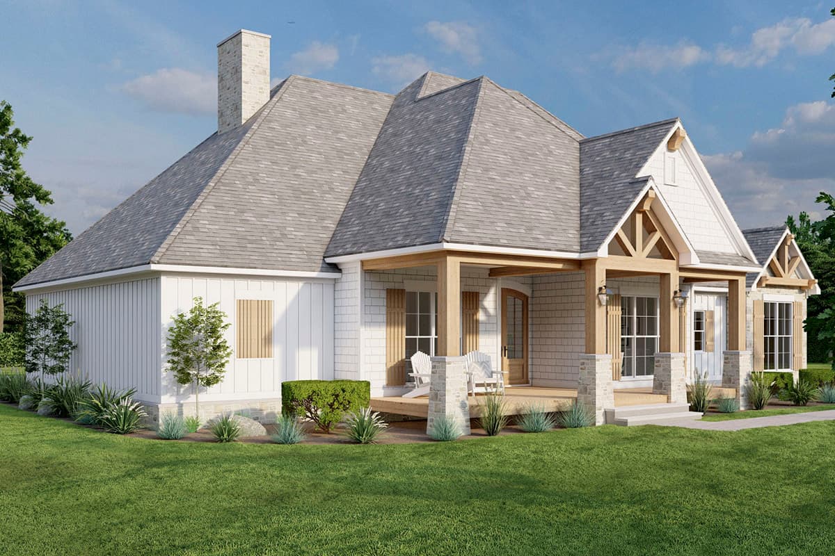 House plan exterior: Ranch style with prominent gables, stone and shingle siding, and a covered front porch with timber supports.