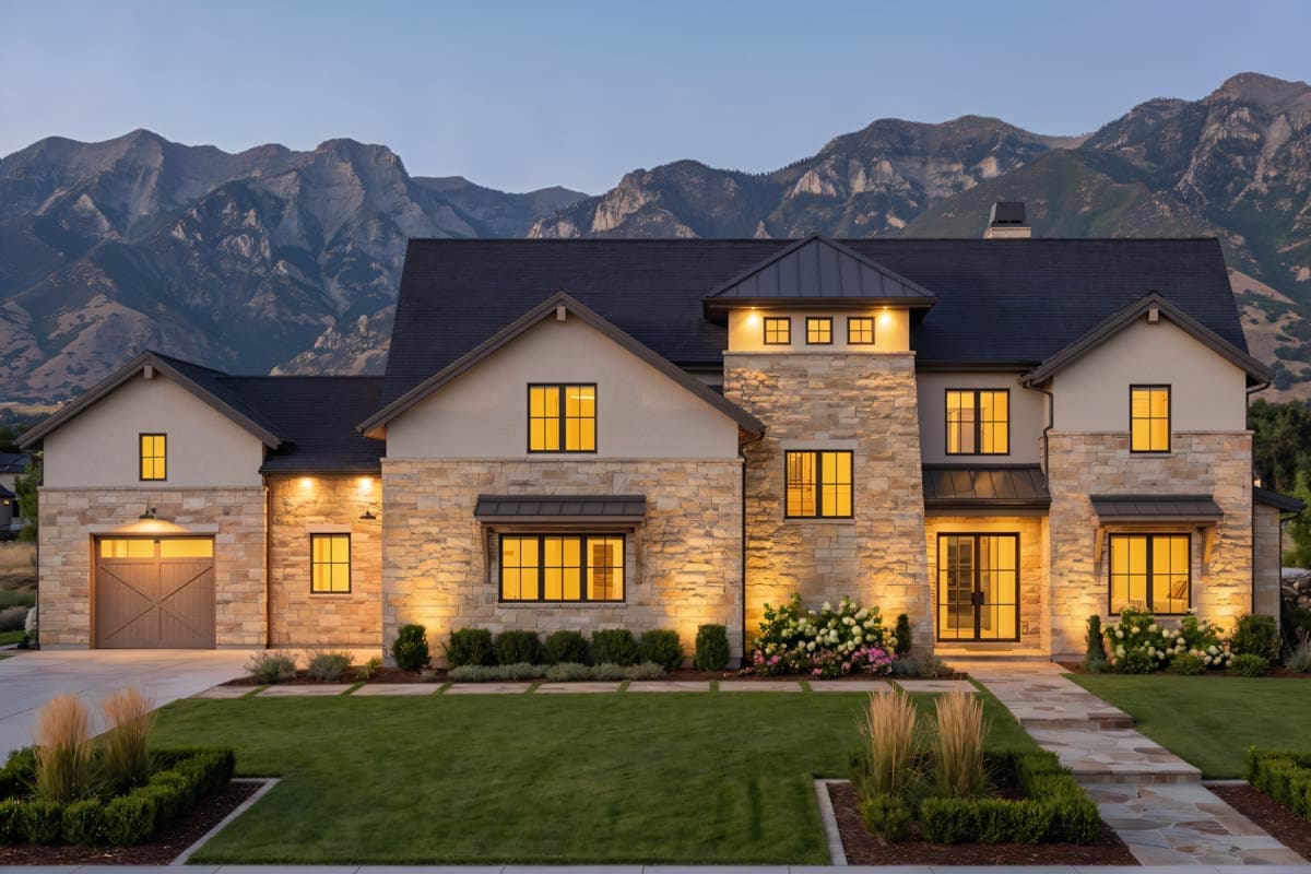 House plan exterior of a two-story Modern Farmhouse with stone accents, gables, and a side-entry garage.