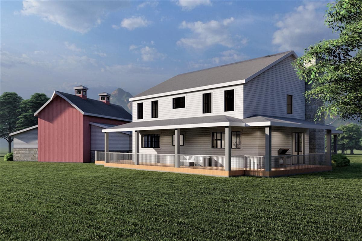 Two-story house plan exterior with wraparound porch, prominent gables on adjacent barn, and stone chimney.