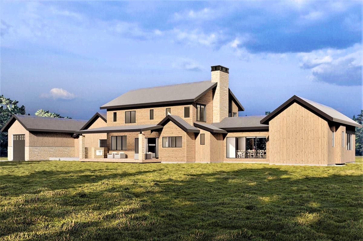 House plan exterior with wood siding, stone accents, multiple gables, prominent stone chimney, and attached garage.