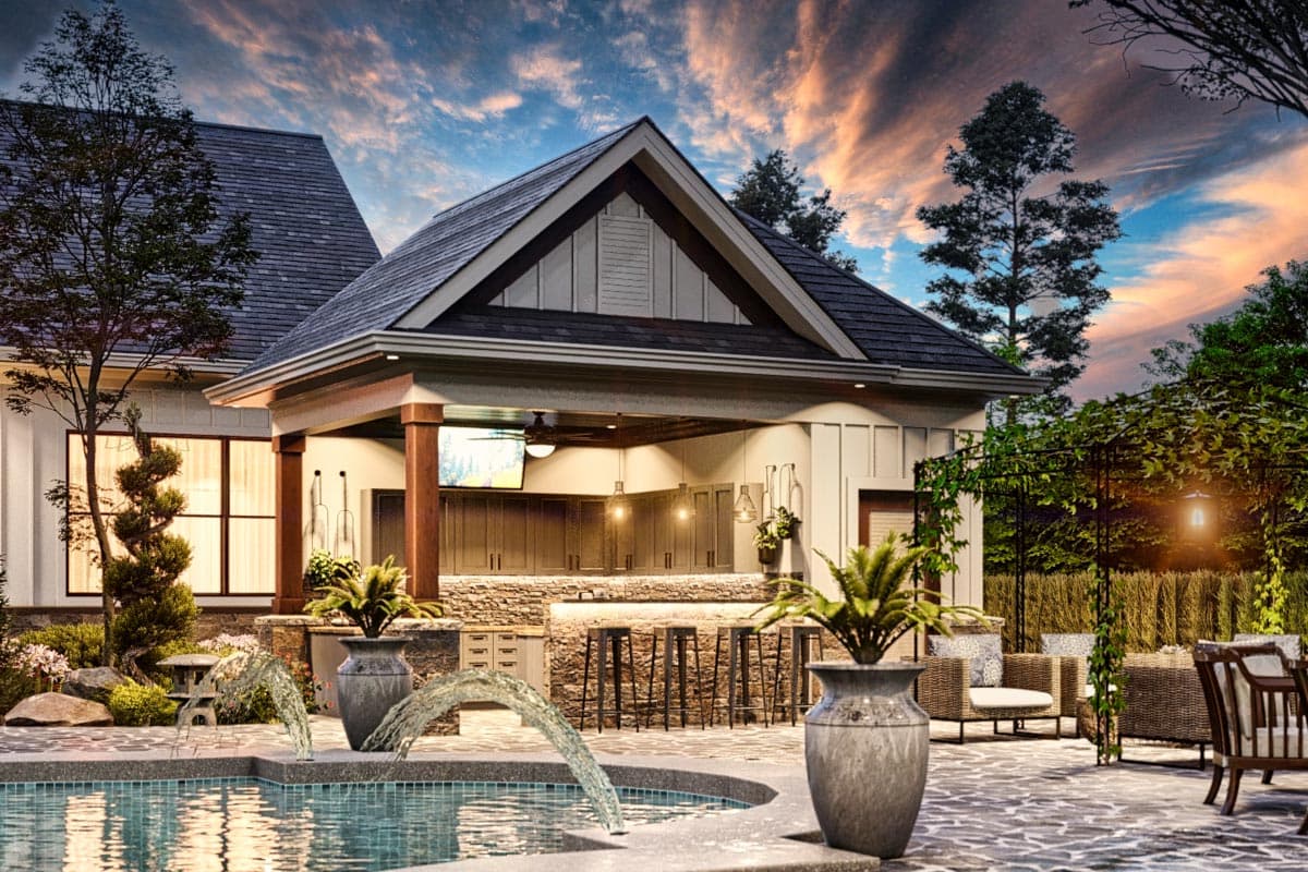 House plan exterior with gabled roof, covered outdoor kitchen with bar, and stone accents, adjacent to a swimming pool.