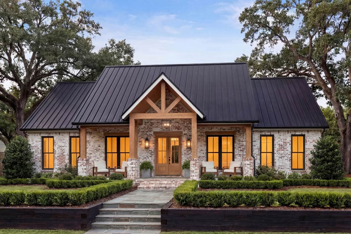 Modern Farmhouse house plan exterior with white brick, gabled roof, wood accents, and covered entry.