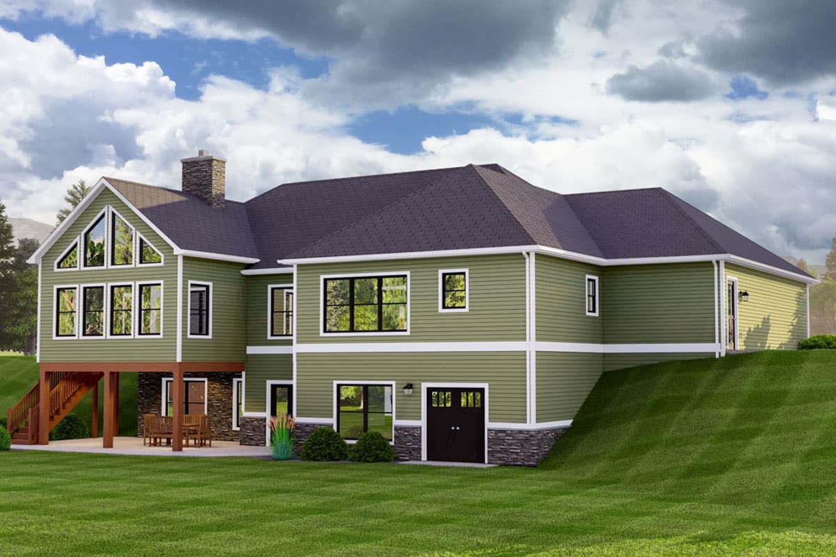 House plan exterior: two-story home with a prominent gable, large windows, stone accents, and a side-entry garage.