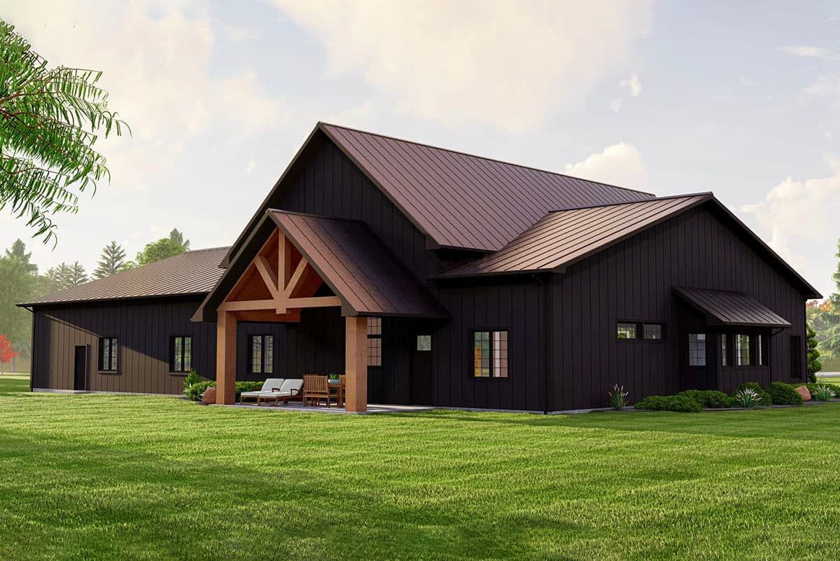 Modern Farmhouse house plan exterior with dark siding, metal roof, covered porch with exposed beams, and multiple gables.