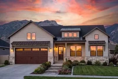 New American Ranch Plan with Vaulted Family Room - Architectural Designs