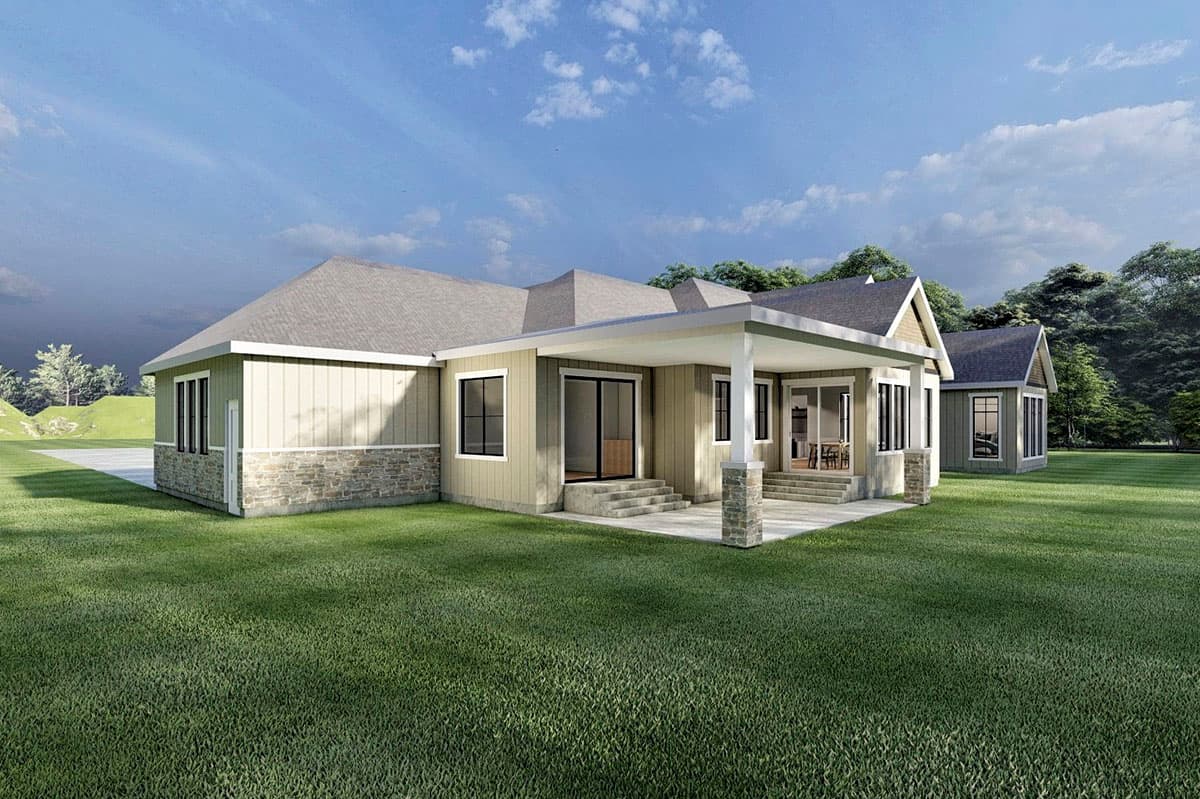 House plan exterior, one story, with covered patio, stone base, and intersecting rooflines.