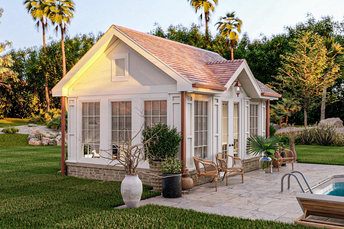 House plan exterior with gabled roof, dormer window, white trim, and stone base.