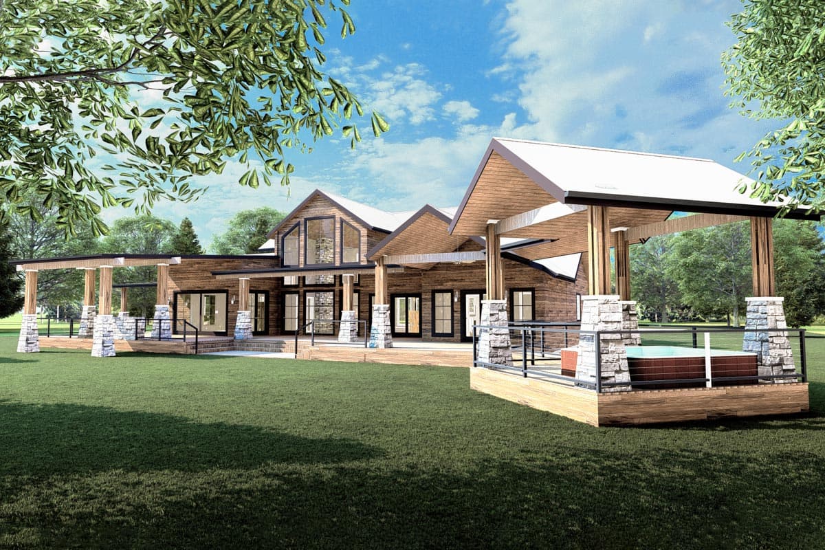 House plan exterior: Modern Farmhouse style, two stories, with a wrap-around porch, prominent gables, and a covered hot tub deck.