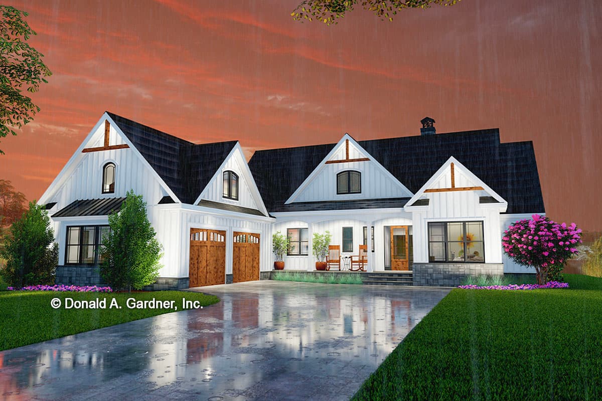 Modern Farmhouse house plan exterior with three gables, a covered porch, and a three-car side-entry garage.