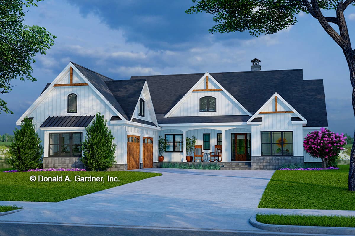 House plan exterior. Modern Farmhouse style, one-story. Features include gabled rooflines, a covered porch, and a two-car garage.