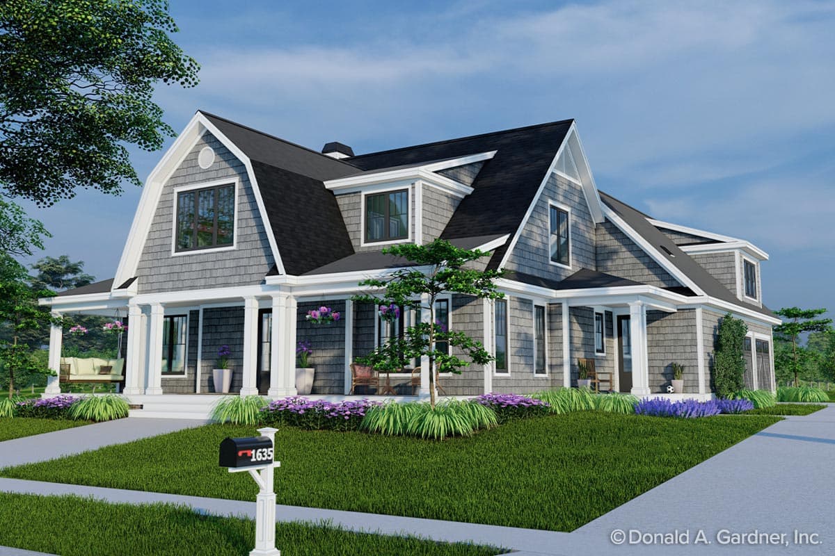 House plan exterior. Two-story home with Craftsman style. Features include a front porch with columns, multiple gables, and shingle siding.