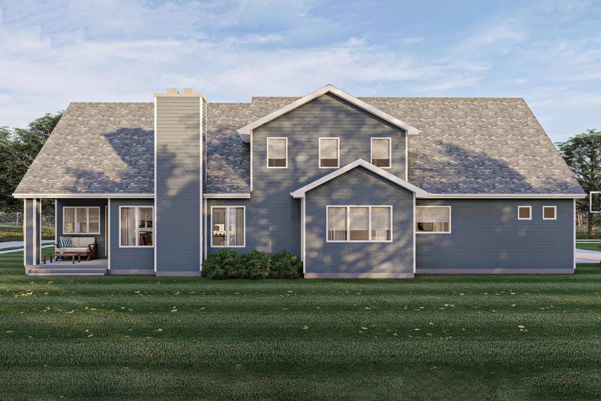 Two-story house plan exterior with prominent chimney, covered porch, multiple gables, and varied window arrangements.