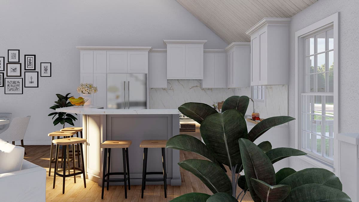 Open concept kitchen with island, bar stools, stainless steel refrigerator, white cabinets, and vaulted ceiling.