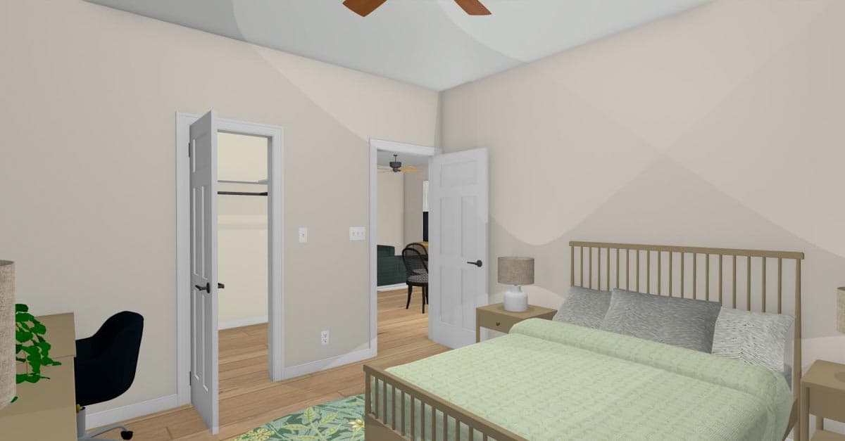 Bedroom interior with bed, nightstand, desk, open closet, and doorway to living area.
