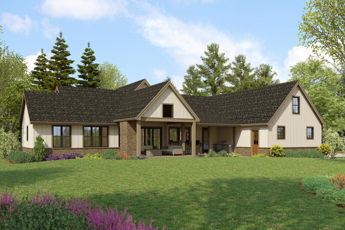 Modern Farmhouse style house plan exterior with stone accents, covered patio, and gabled rooflines.