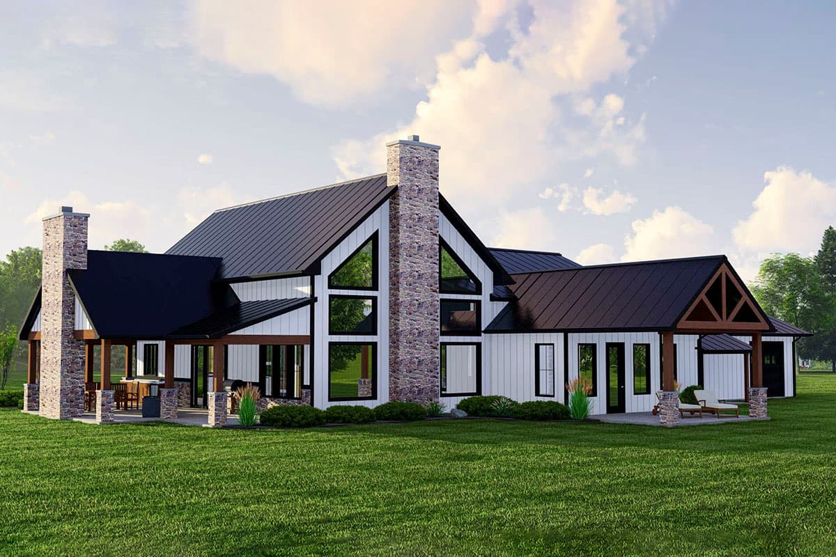 Modern farmhouse house plan exterior with metal roof, stone accents, covered porch, and prominent gable dormers.