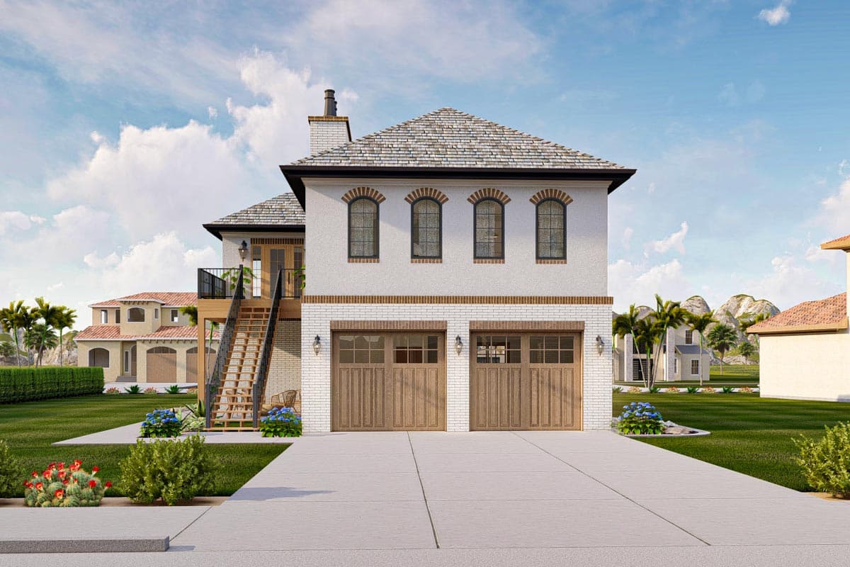 House plan exterior. Two-story, stucco facade with brick accents. Features include arched windows, a hip roof, and a two-car garage.
