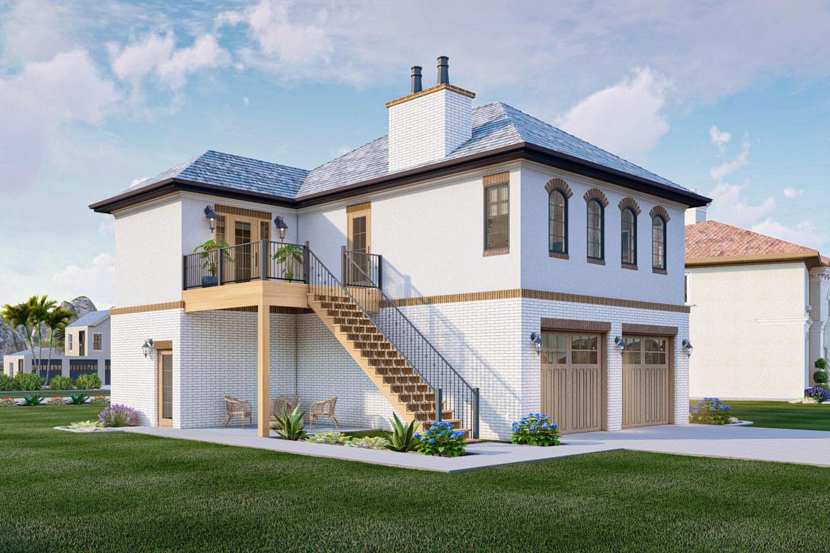 House plan exterior: White brick two-story home with two-car garage, upper-level balcony, and exterior staircase.