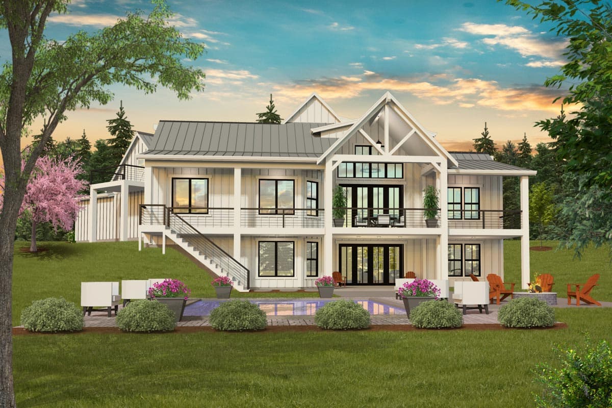 Modern Farmhouse house plan exterior with metal roof, multiple gables, balconies, and large windows.