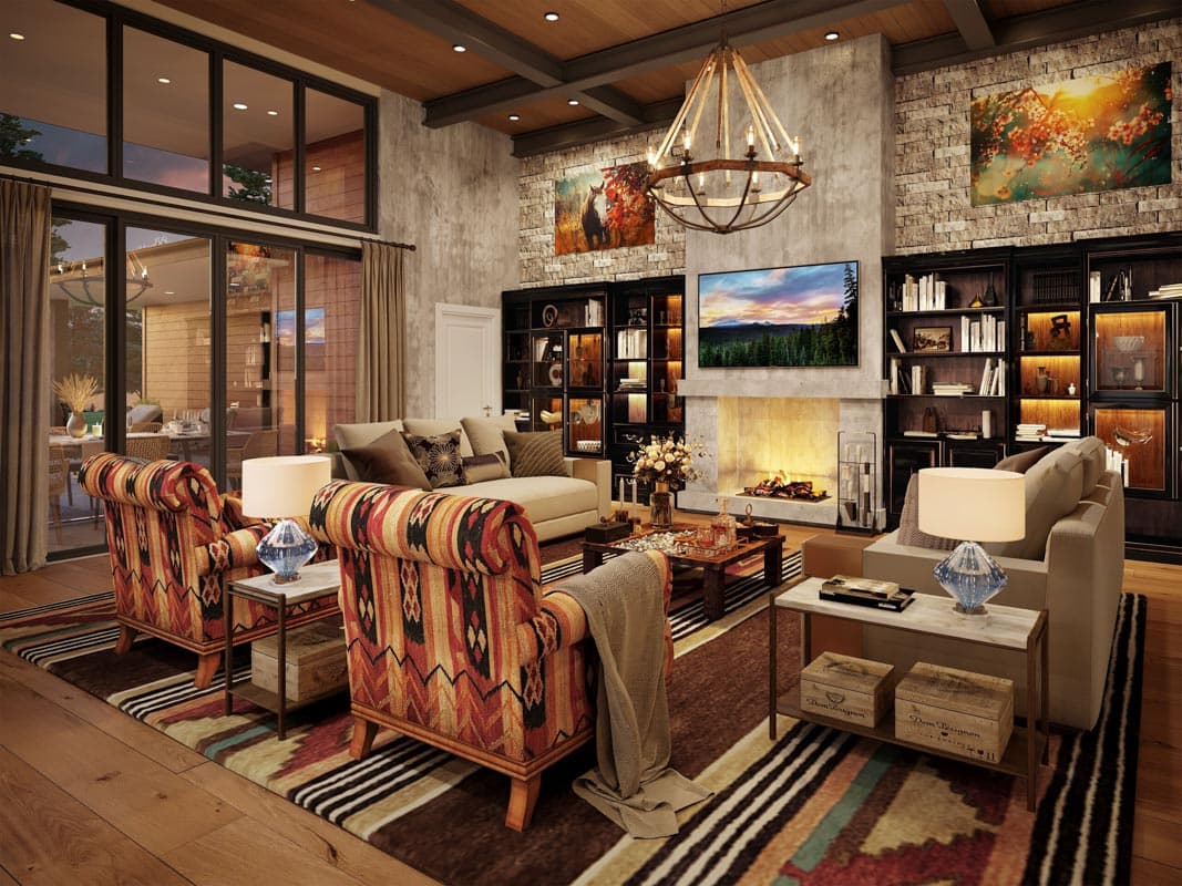 Great room interior: large windows, stone fireplace, built-in bookshelves, wood ceiling, and exposed beams.