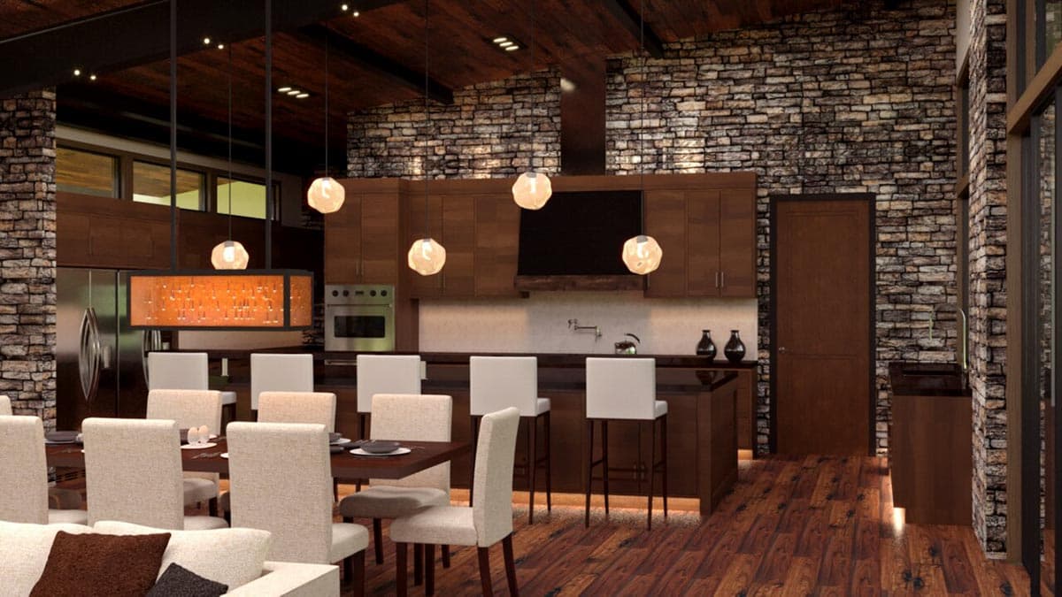 Open concept living area with stone accent walls, dark wood cabinetry, island seating, and a dining area.