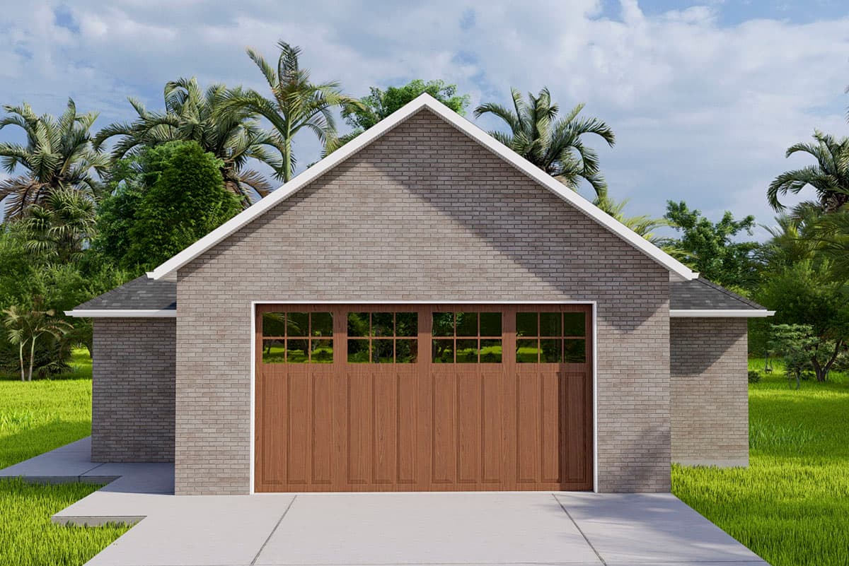 House plan exterior featuring a brick facade, gable roof, and a wooden garage door with window inserts.