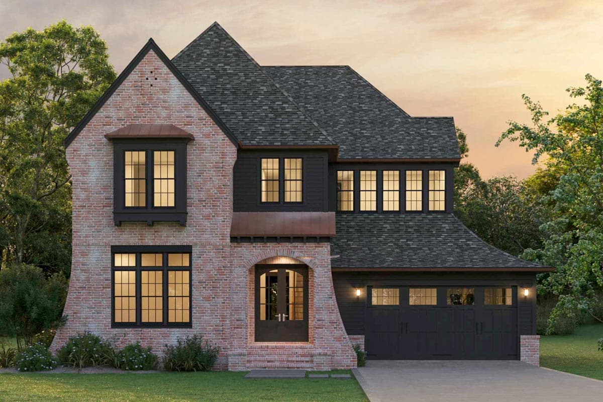 House plan exterior: Two-story brick and siding home with a prominent gable, arched entry, bay windows, and a three-car garage.