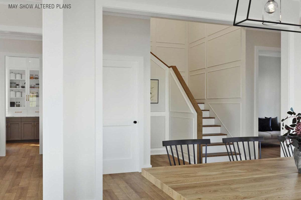 Plan 50219PH: Tudor-Inspired 4-Bed House Plan with Bonus Expansion