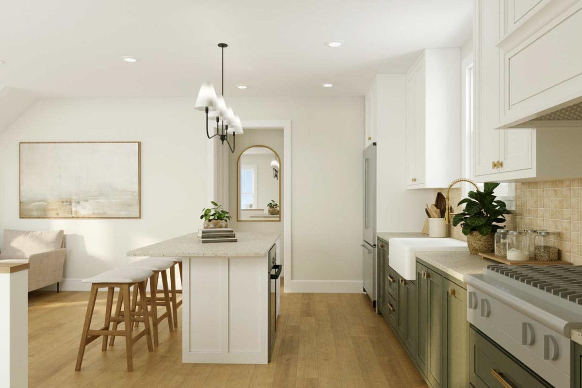 Kitchen with island seating, farmhouse sink, white cabinets, green lower cabinets, and a modern chandelier.