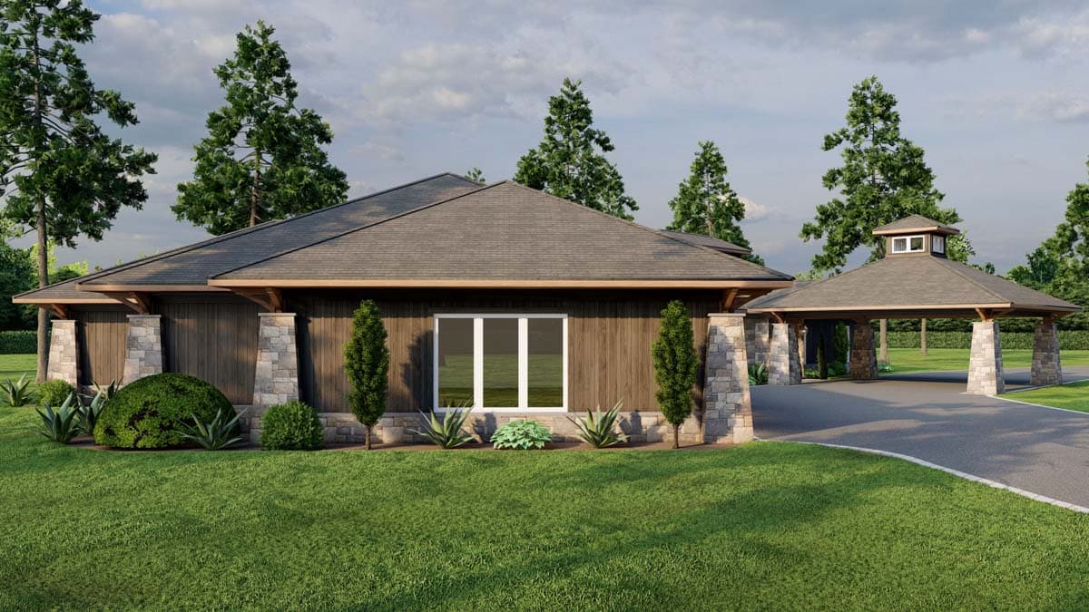 House plan exterior with a low-pitched hip roof, wood siding, stone accents, and a detached carport with cupola.