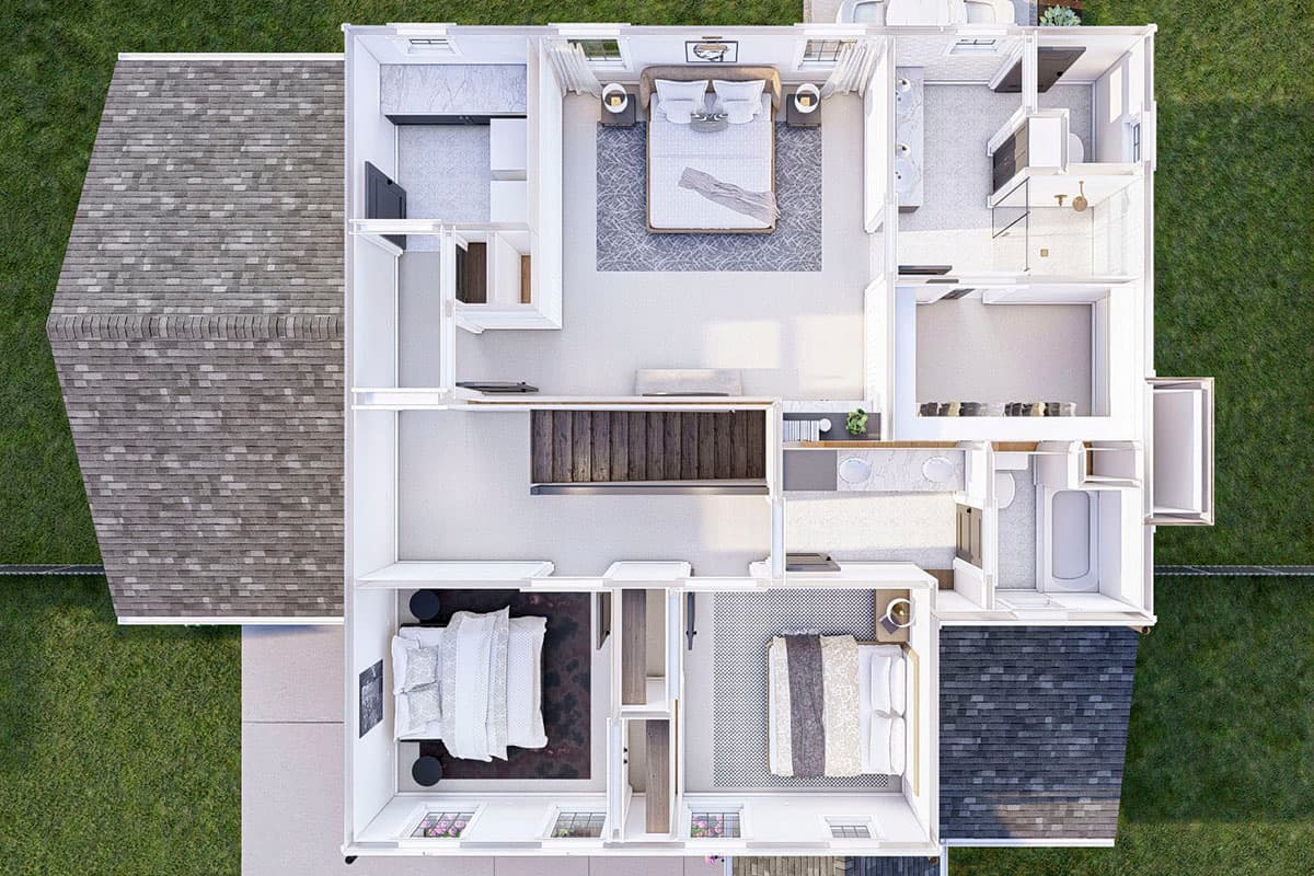Top-down view of a house plan showing three bedrooms, two bathrooms, and an open living area with a kitchen island and fireplace.