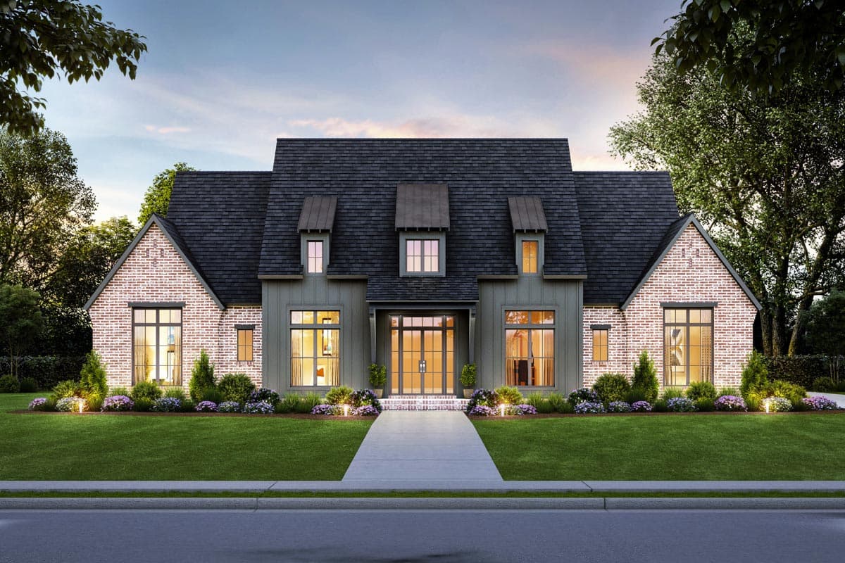 House plan exterior. Two-story home with a gabled roof, brick accents, and dormers. Features include a centered entryway and dark-colored siding.