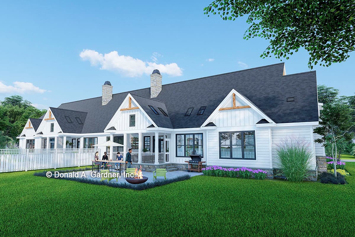 House plan exterior, Modern Farmhouse style, one story, with gables, dormers, stone chimneys, and a covered porch.