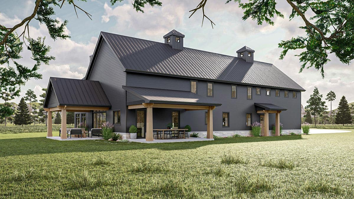 Modern farmhouse house plan exterior with a dark gray metal roof, covered porches, and two cupolas.