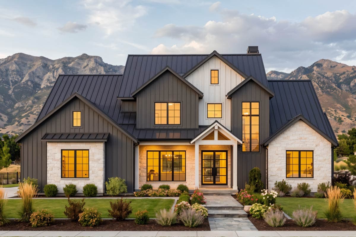 Modern Farmhouse house plan exterior with metal roof, stone and board-and-batten siding, and multiple gables.