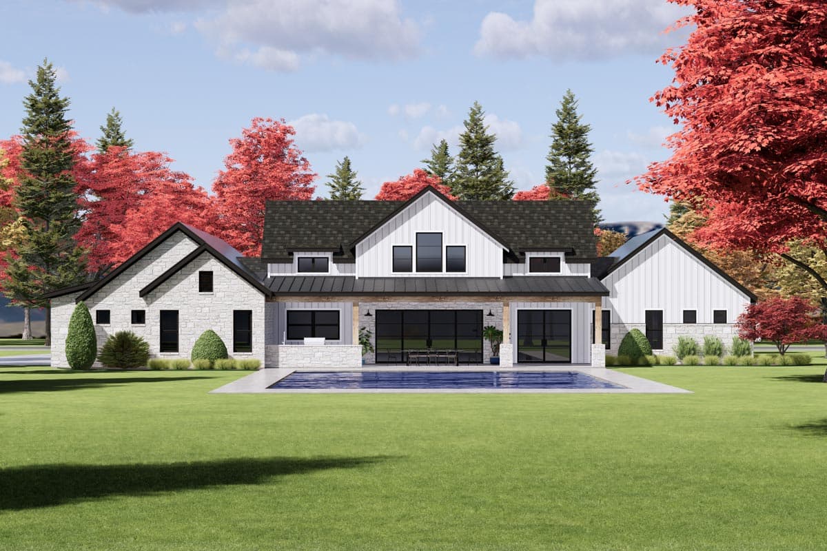 Modern Farmhouse house plan exterior with gables, stone accents, large windows, and covered patio overlooking a pool.