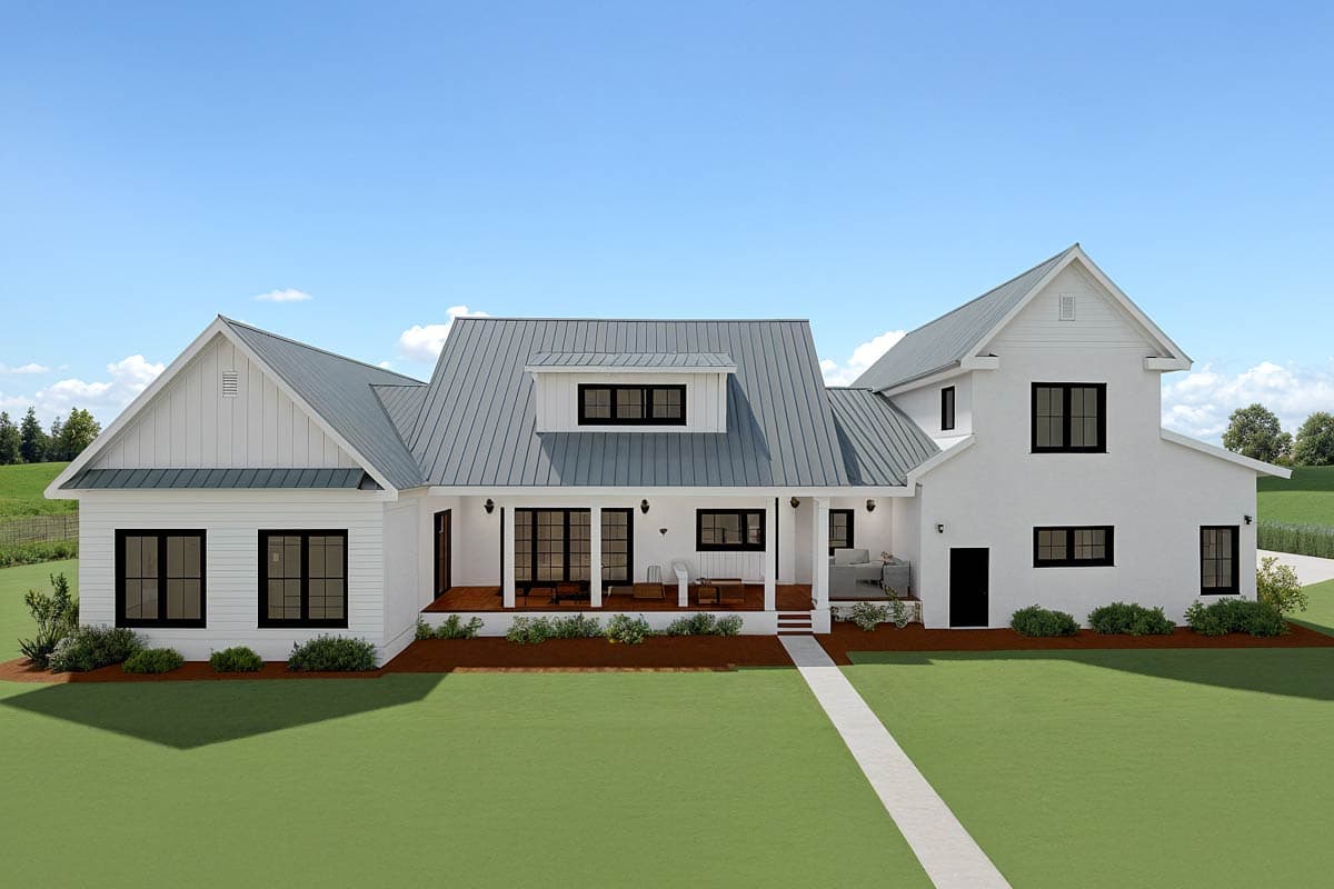 House plan exterior: Modern Farmhouse style with a wraparound porch, metal gable roofs, and dormers.