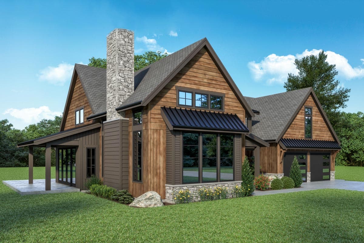 Modern Farmhouse house plan exterior with stone chimney, gables, covered porch, and a two-car garage.