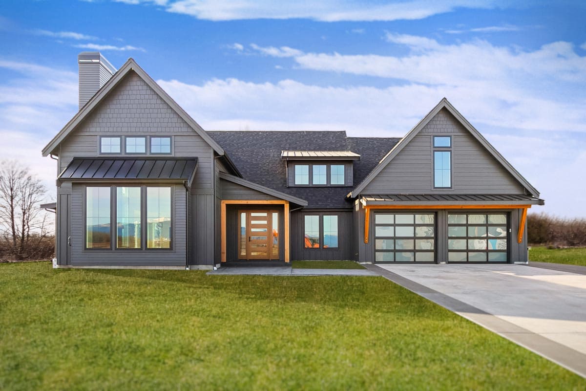 House plan exterior featuring a two-story Modern Farmhouse design. Includes a gable roofline, glass garage doors, and a covered entry porch.