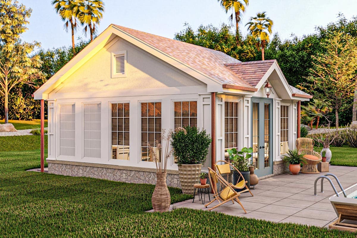 House plan exterior: Single-story structure with a gable roof, stone foundation, and multiple tall windows.