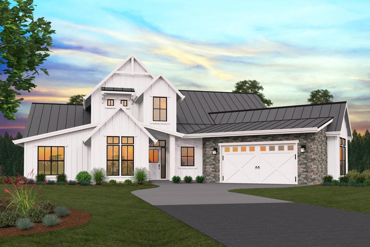 Modern Farmhouse house plan exterior with white board and batten siding, metal roof, stone accents, and a two-car garage.