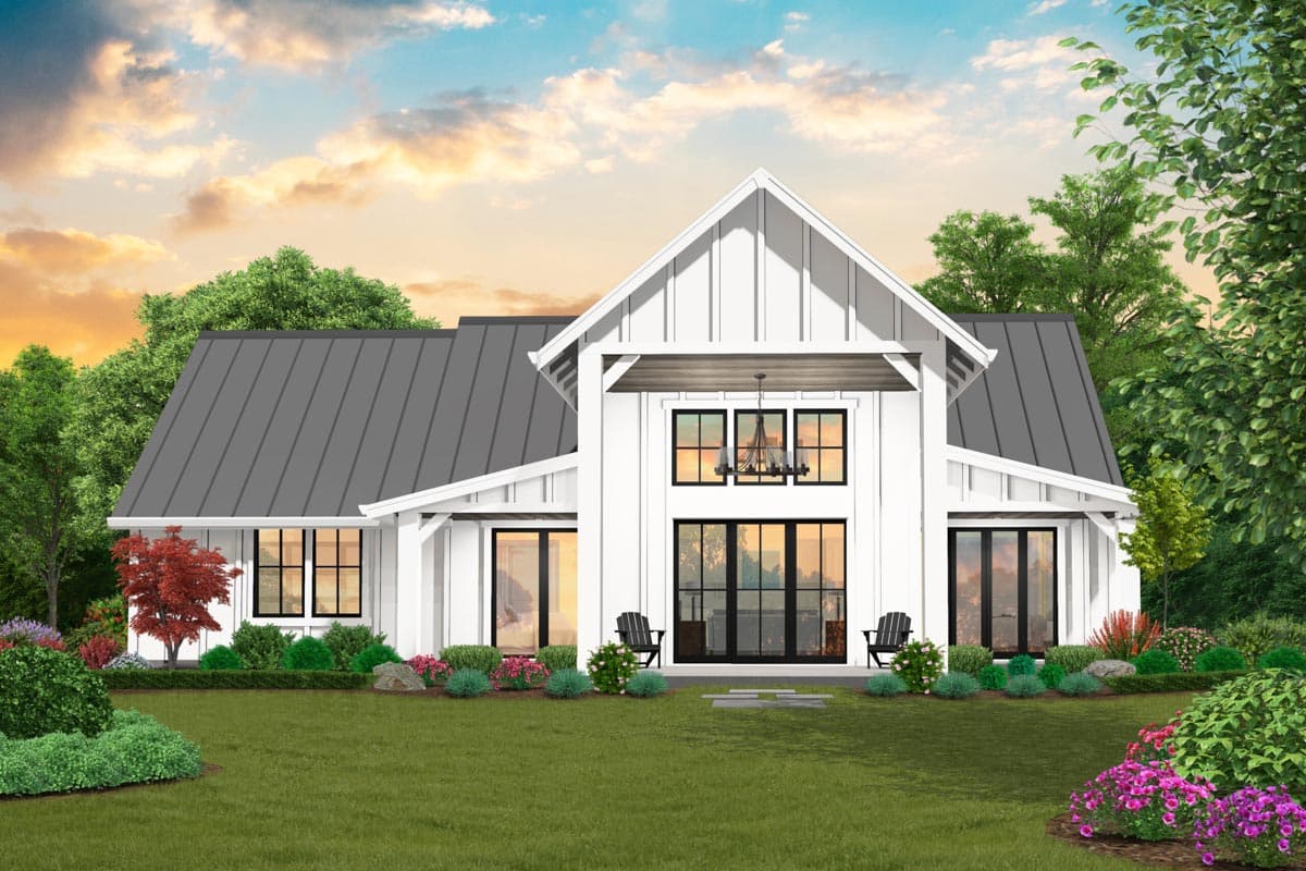 Modern Farmhouse house plan exterior with gables, metal roof, and large windows.