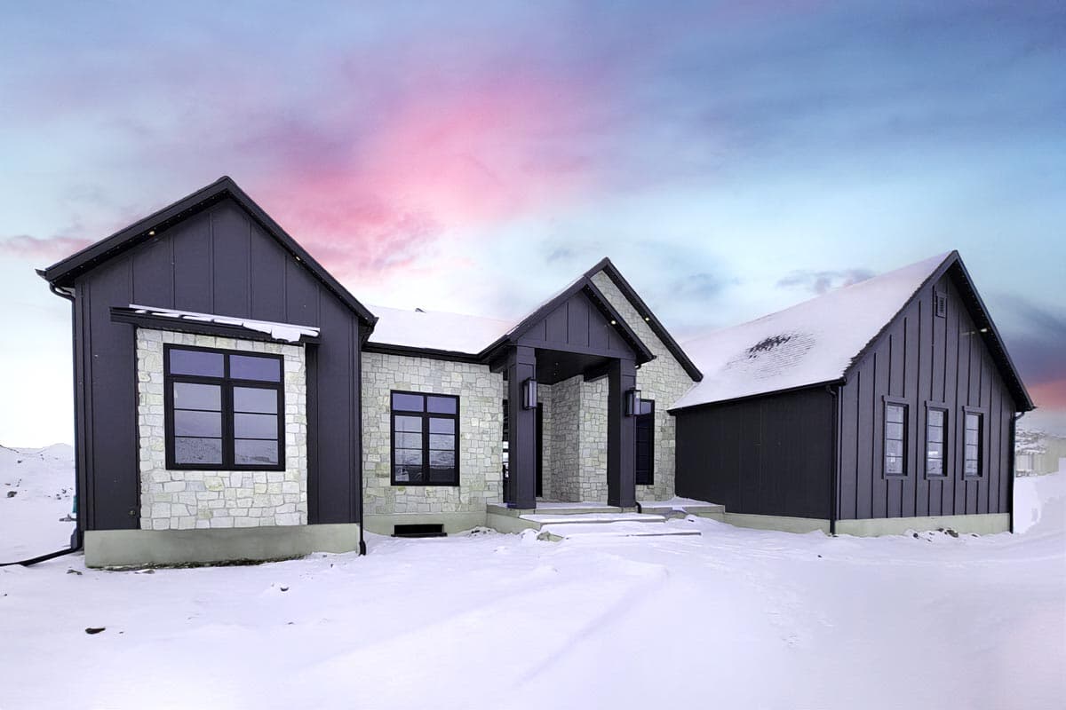 Modern house plan exterior with stone and dark vertical siding, gabled rooflines, and covered entry with dark columns.