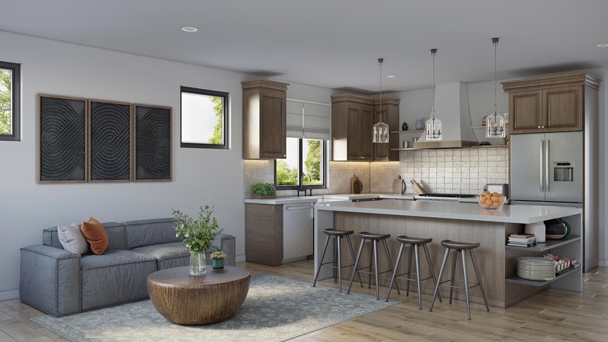 Open concept living area with kitchen island, pendant lights, sofa, coffee table, and decorative wall art.