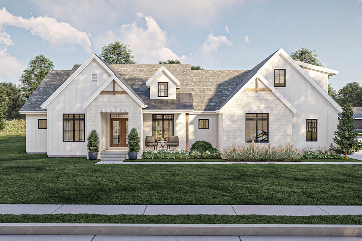 House plan exterior. Modern farmhouse style with gabled roof, dormers, and front porch. Two story home with brick and siding exterior.