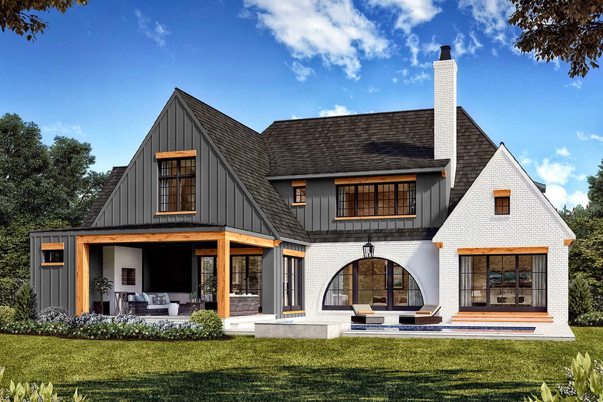 House plan exterior: Modern Farmhouse style with white brick, dark metal siding, gables, large arched window, and covered porch.