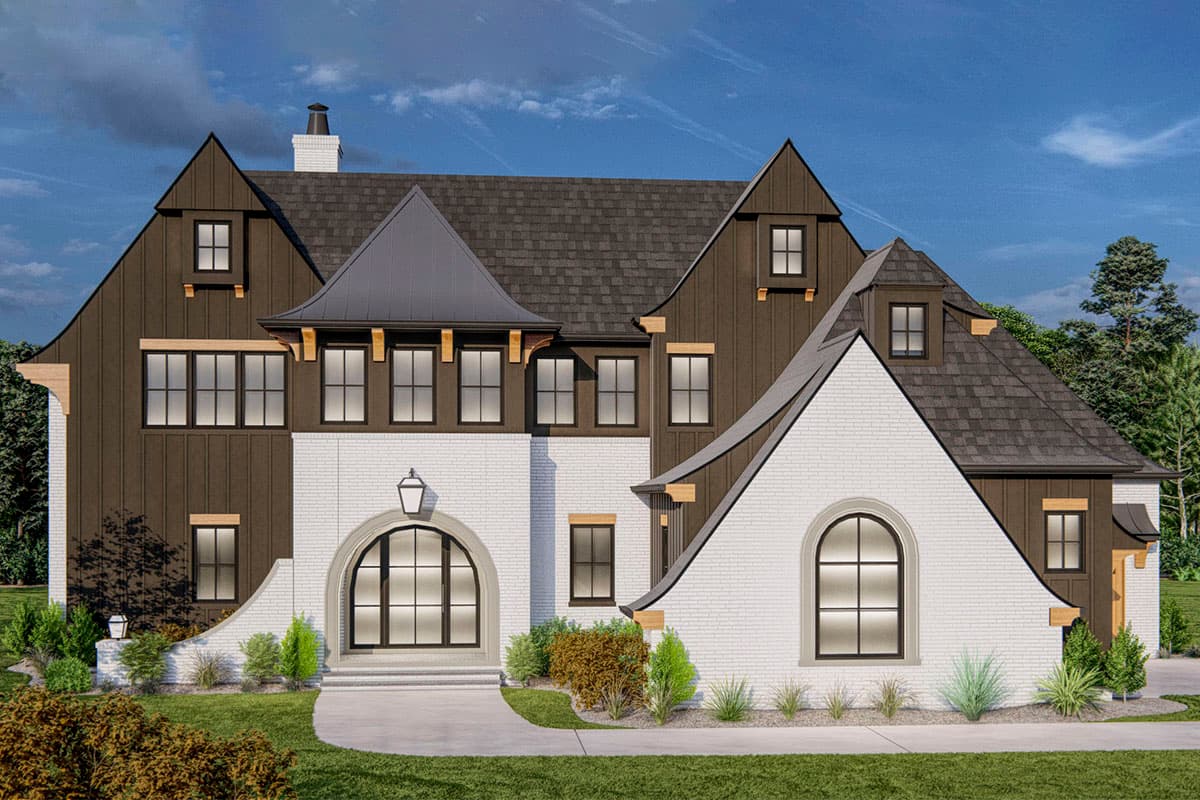 House plan exterior. Two-story with dark gabled roof, brick and board-and-batten siding, dormers, and arched entryway.