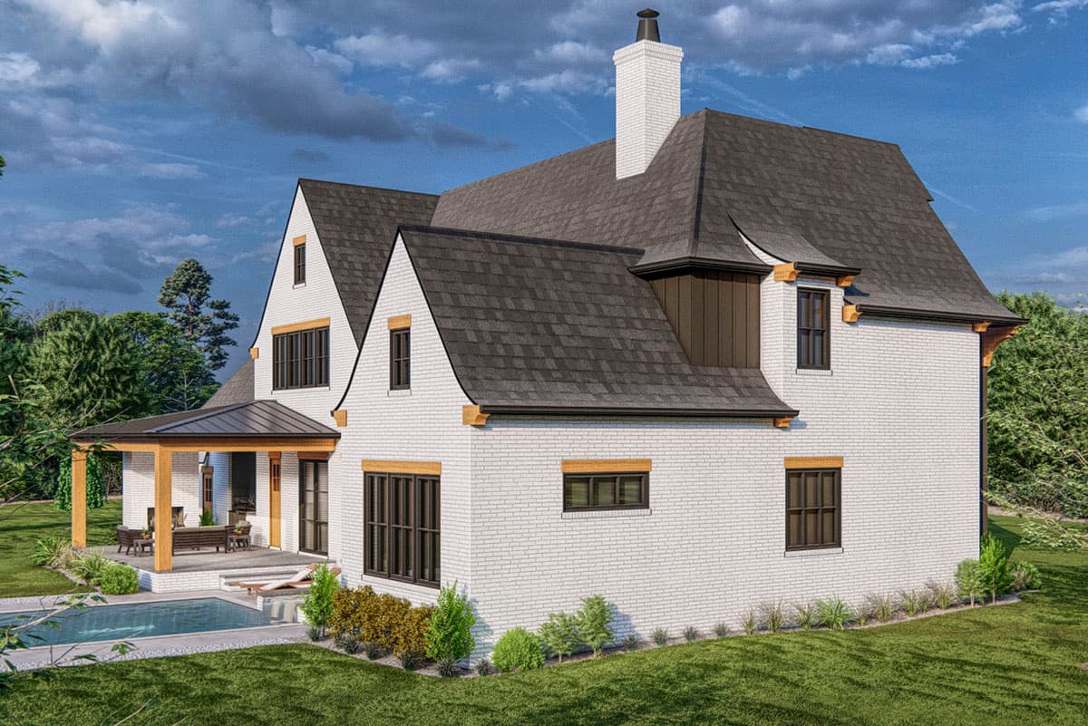House plan exterior of a two-story French Provincial home with white brick, gables, and a covered porch with wood beams.