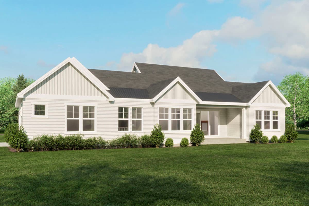 House plan exterior: Ranch-style, single-story with multiple gables, white siding, and large windows.